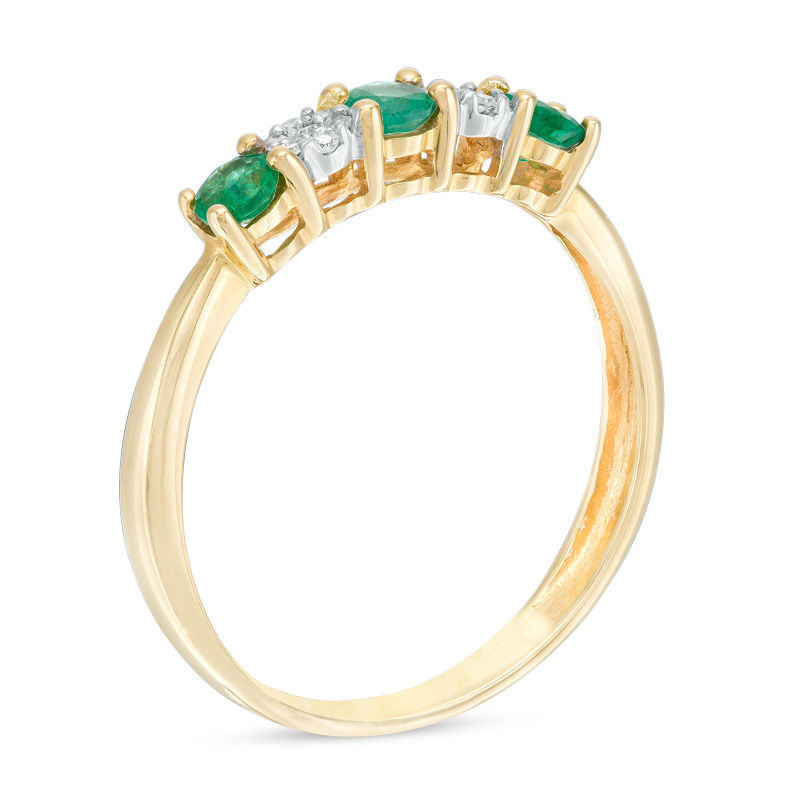 Previously Owned - Emerald and 0.04 CT. T.W. Composite Diamond Five Stone Ring in 10K Gold