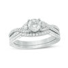 Thumbnail Image 0 of Previously Owned - 0.88 CT. T.W. Diamond Twist Bridal Set in Platinum