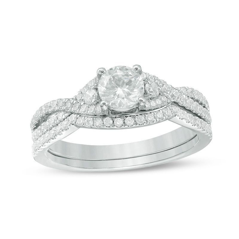 Previously Owned - 0.88 CT. T.W. Diamond Twist Bridal Set in Platinum