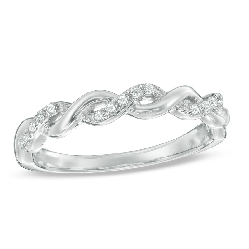 Previously Owned - 0.12 CT. T.W. Diamond Twisting Anniversary Band in 10K White Gold