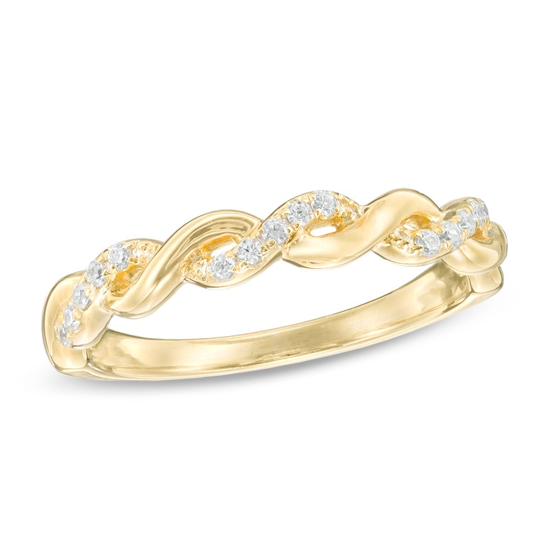 Previously Owned - 0.12 CT. T.W. Diamond Twisting Anniversary Band in 10K Gold