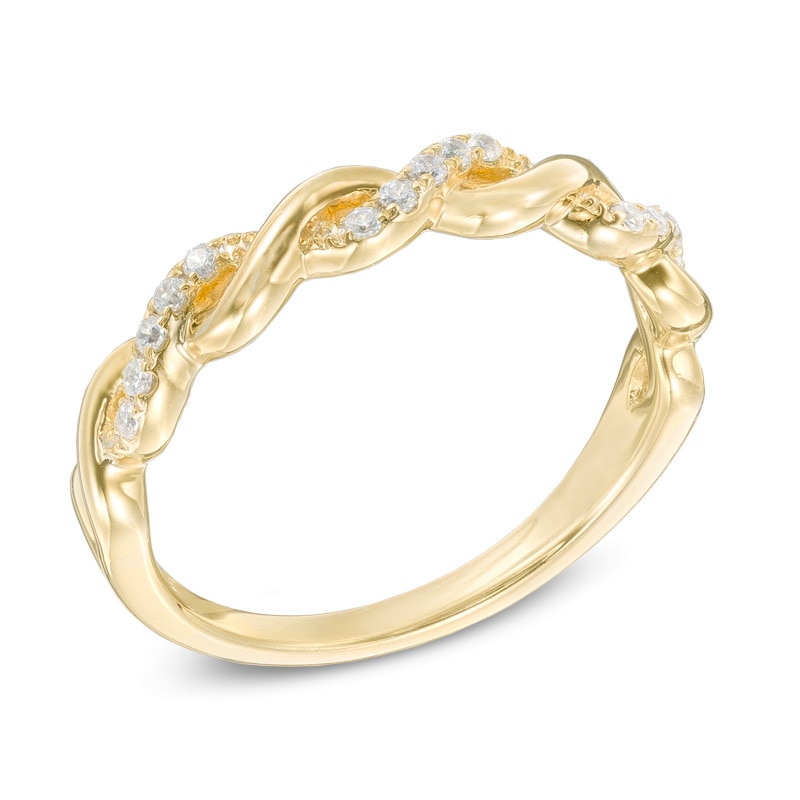 Previously Owned - 0.12 CT. T.W. Diamond Twisting Anniversary Band in 10K Gold