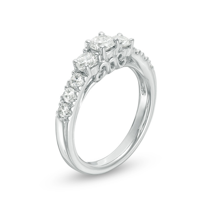 Previously Owned - Celebration Ideal 1.21 CT. T.W. Diamond Three Stone Ring in 14K White Gold