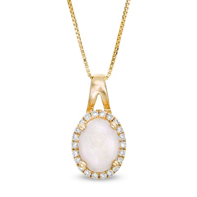 Previously Owned - Oval Opal and 0.09 CT. T.W. Diamond Frame Pendant in 10K Gold