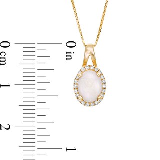 Previously Owned - Oval Opal and 0.09 CT. T.W. Diamond Frame Pendant in 10K Gold