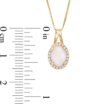 Previously Owned - Oval Opal and 0.09 CT. T.W. Diamond Frame Pendant in 10K Gold