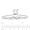 Previously Owned - 0.15 CT. T.W. Diamond Twist Bolo Bracelet in Sterling Silver - 9.5"