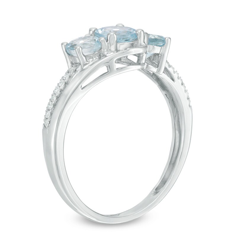 Main Image 2 of Previously Owned - Aquamarine and 0.04 CT. T.W. Diamond Three Stone Bypass Ring in 10K White Gold