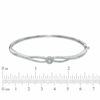 Thumbnail Image 1 of Previously Owned - 0.14 CT. T.W. Canadian Diamond Centre Braid Bangle in Sterling Silver
