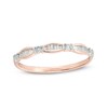 Thumbnail Image 1 of Previously Owned - 0.05 CT. T.W. Baguette and Round Diamond Station Anniversary Band in 10K Rose Gold