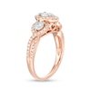 Thumbnail Image 1 of Previously Owned - 0.70 CT. T.W. Diamond Past Present Future® Pear-Shaped Frame Twist Engagement Ring in 10K Rose Gold