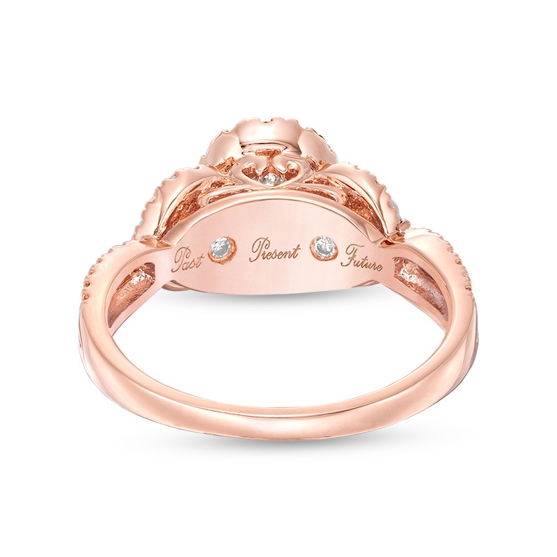 Previously Owned - 0.70 CT. T.W. Diamond Past Present Future® Pear-Shaped Frame Twist Engagement Ring in 10K Rose Gold