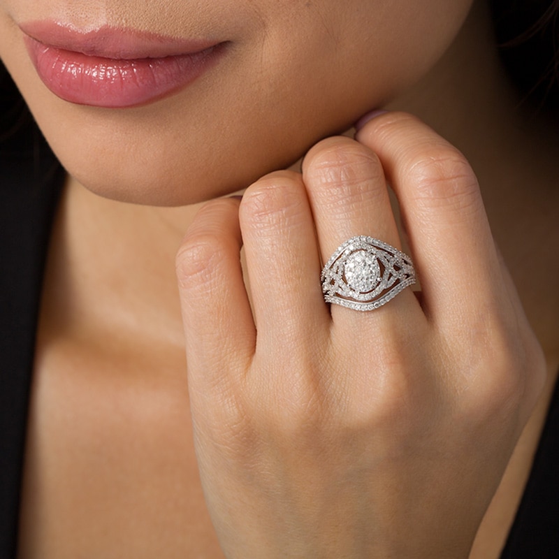 Previously Owned - 1.50 CT. T.W. Composite Diamond Bypass Oval Frame Crossover Ring in 10K White Gold