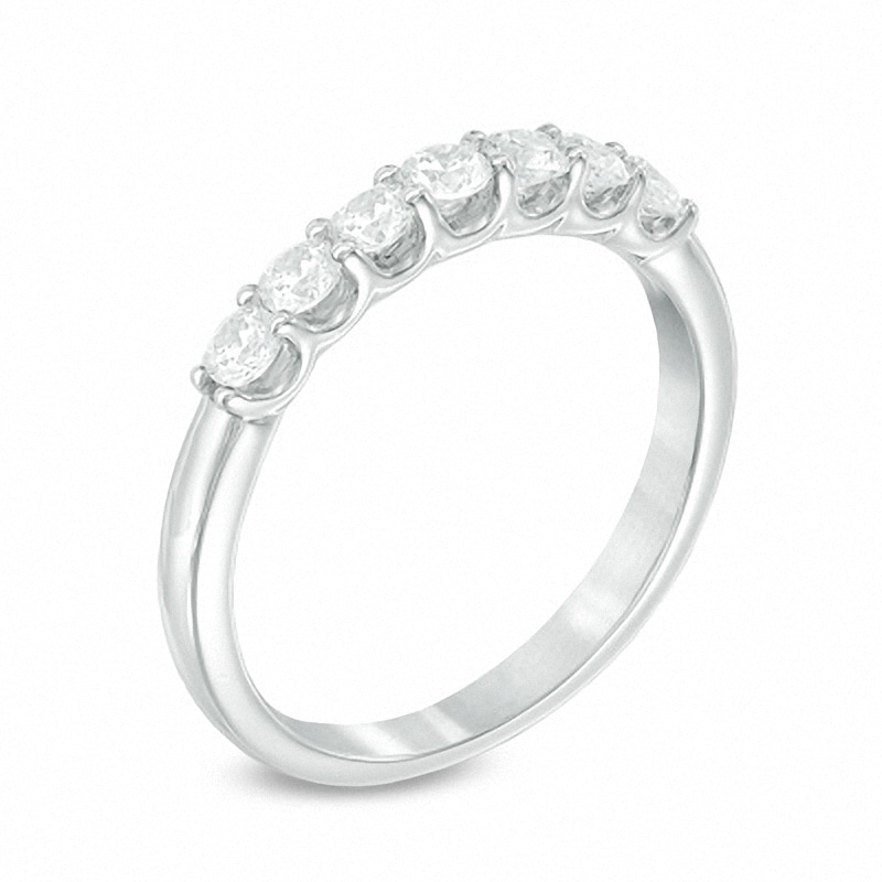 Previously Owned - Celebration Canadian Ideal 0.50 CT. T.W. Diamond Seven Stone Band in 14K White Gold (I/I1)