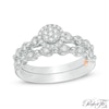 Thumbnail Image 1 of Previously Owned - Perfect Fit 0.23 CT. T.W. Multi-Diamond Frame Vintage-Style Interlocking Bridal Set in 10K White Gold