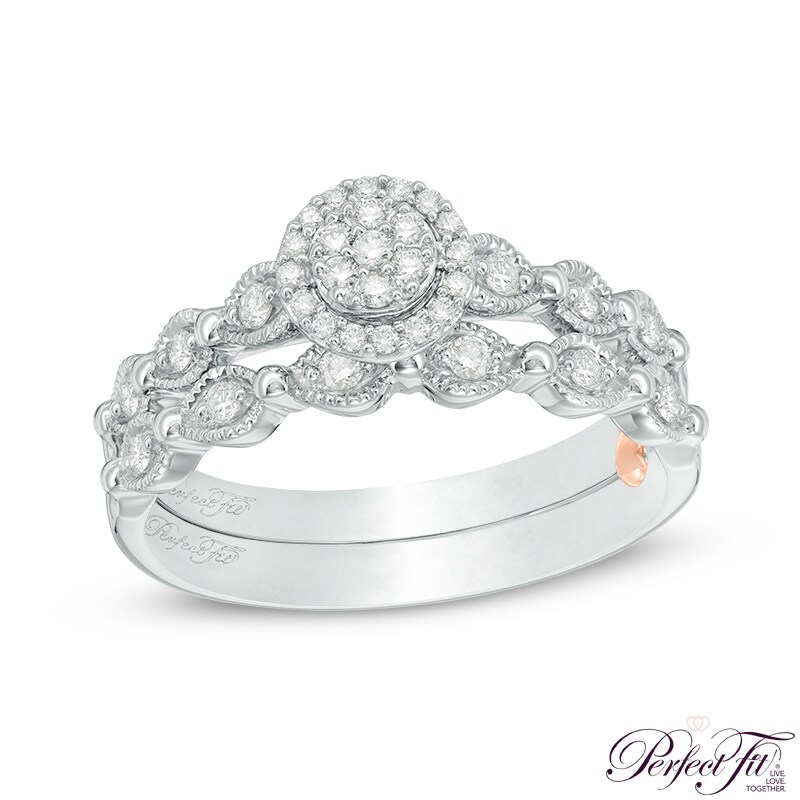 Previously Owned - Perfect Fit 0.23 CT. T.W. Multi-Diamond Frame Vintage-Style Interlocking Bridal Set in 10K White Gold