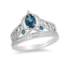 Previously Owned - Enchanted Disney Cinderella London Blue Topaz and 0.085 CT. T.W. Diamond Ring in Sterling Silver