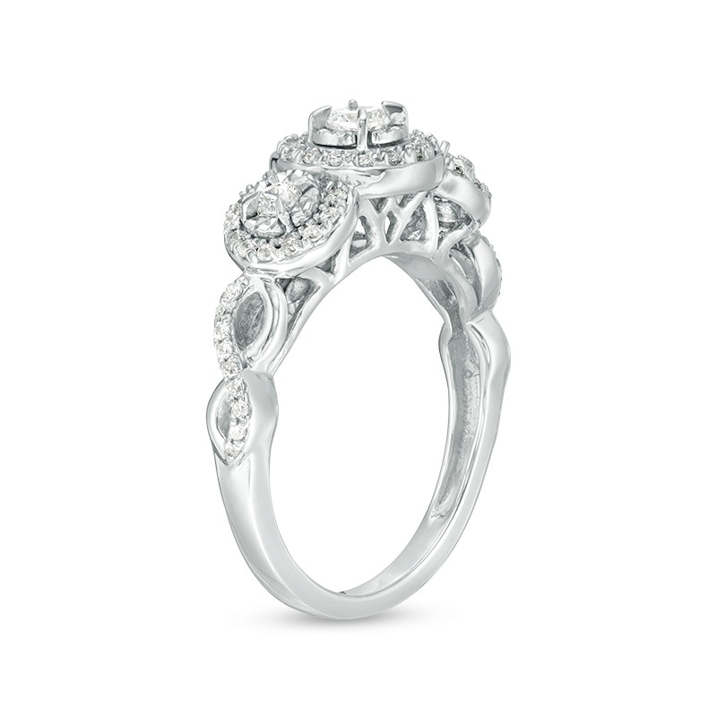 Previously Owned - 0.50 CT. T.W. Diamond Past Present Future® Frame Twist Engagement Ring in 10K White Gold