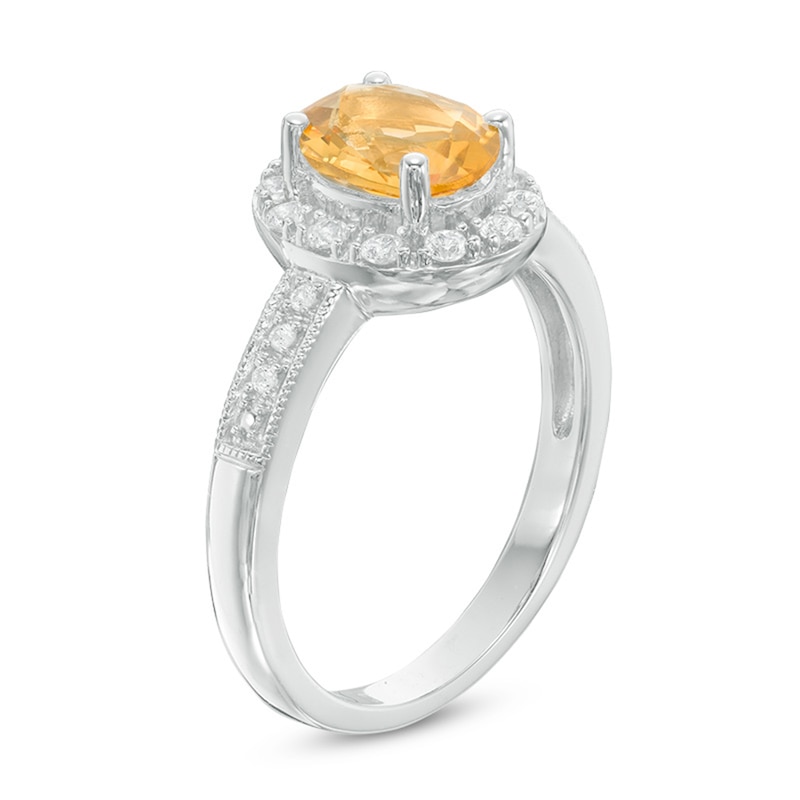 Previously Owned - Oval Citrine and Lab-Created White Sapphire Frame Vintage-Style Ring in Sterling Silver