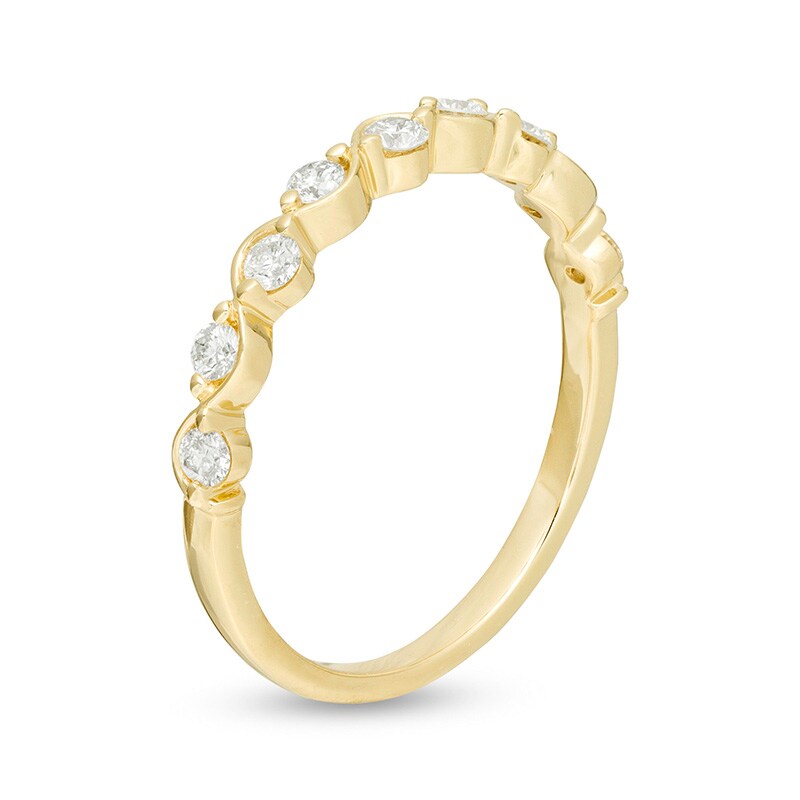 Previously Owned - 0.30 CT. T.W. Diamond Wavy Wedding Band in 10K Gold