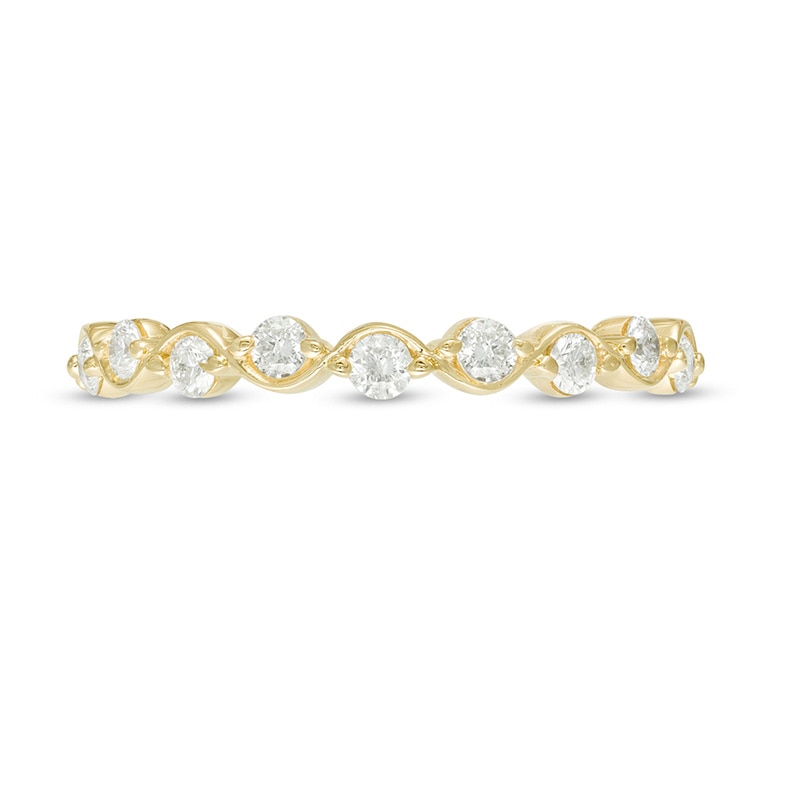 Previously Owned - 0.30 CT. T.W. Diamond Wavy Wedding Band in 10K Gold