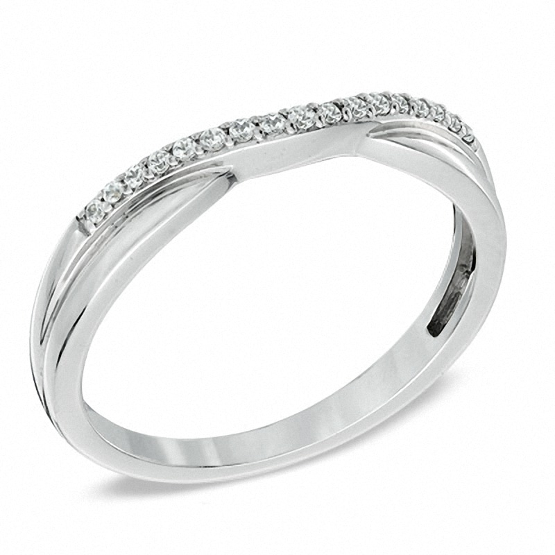 Previously Owned - 0.10 CT. T.W. Diamond Twist Contour Wedding Band in 14K White Gold
