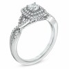 Thumbnail Image 1 of Previously Owned - Celebration Canadian Fire™ 0.58 CT. T.W. Diamond Frame Engagement Ring in 14K White Gold