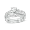 Previously Owned - 1.20 CT. T.W. Diamond Bypass Bridal Set in 14K White Gold (I/I2)