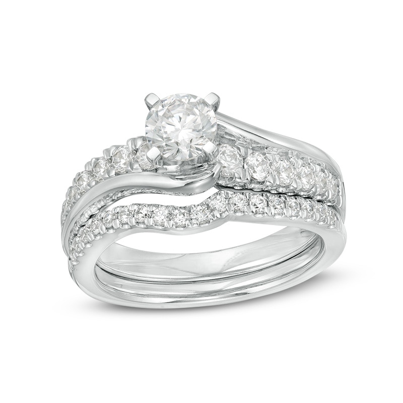 Previously Owned - 1.20 CT. T.W. Diamond Bypass Bridal Set in 14K White Gold (I/I2)