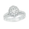 Thumbnail Image 1 of Previously Owned - 1.00 CT. T.W. Oval Diamond Double Scallop Frame Bridal Set in 14K White Gold