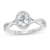 Thumbnail Image 0 of Previously Owned - Oval Aquamarine and 0.08 CT. T.W. Diamond Frame Twist Shank Ring in 10K White Gold