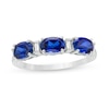 Thumbnail Image 0 of Previously Owned - Oval Lab-Created Blue Sapphire and Baguette Diamond Accent Three Stone Ring in Sterling Silver