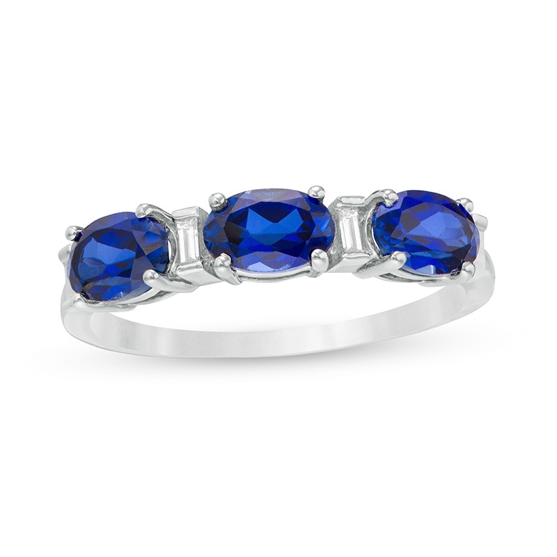 Previously Owned - Oval Lab-Created Blue Sapphire and Baguette Diamond Accent Three Stone Ring in Sterling Silver