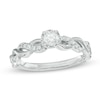 Previously Owned - 0.33 CT. T.W. Diamond Twist Shank Engagement Ring in 10K White Gold