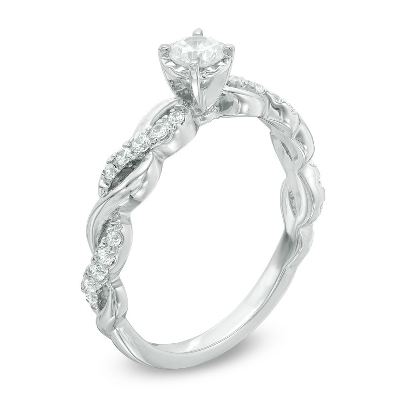 Previously Owned - 0.33 CT. T.W. Diamond Twist Shank Engagement Ring in 10K White Gold