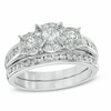Previously Owned - 1.00 CT. T.W. Diamond Three Stone Frame Bridal Set in 14K White Gold