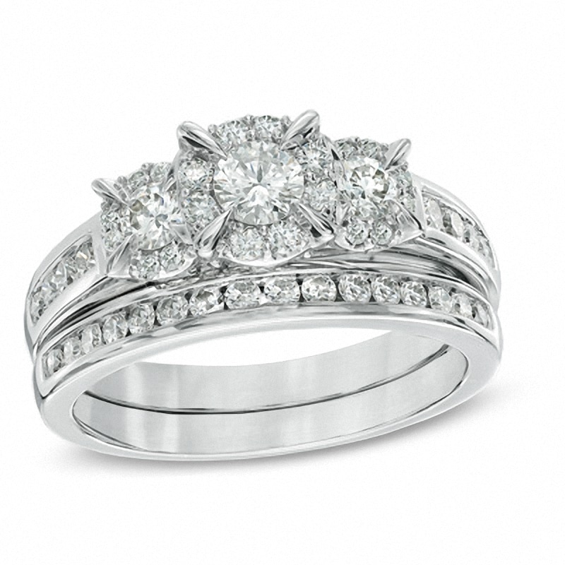 Previously Owned - 1.00 CT. T.W. Diamond Three Stone Frame Bridal Set in 14K White Gold