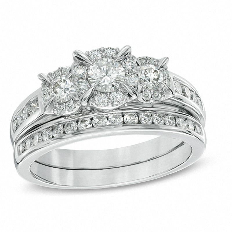 Previously Owned - 1.00 CT. T.W. Diamond Three Stone Frame Bridal Set in 14K White Gold|Peoples Jewellers