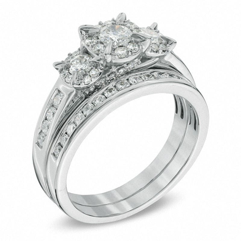 Previously Owned - 1.00 CT. T.W. Diamond Three Stone Frame Bridal Set in 14K White Gold