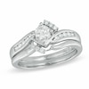 Thumbnail Image 0 of Previously Owned - 0.50 CT. T.W. Diamond Tilted Bypass Bridal Set in 10K White Gold
