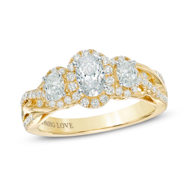 Previously Owned - Vera Wang Love Collection 0.95 CT. T.W. Oval Diamond Three Stone Engagement Ring in 14K Gold|Peoples Jewellers