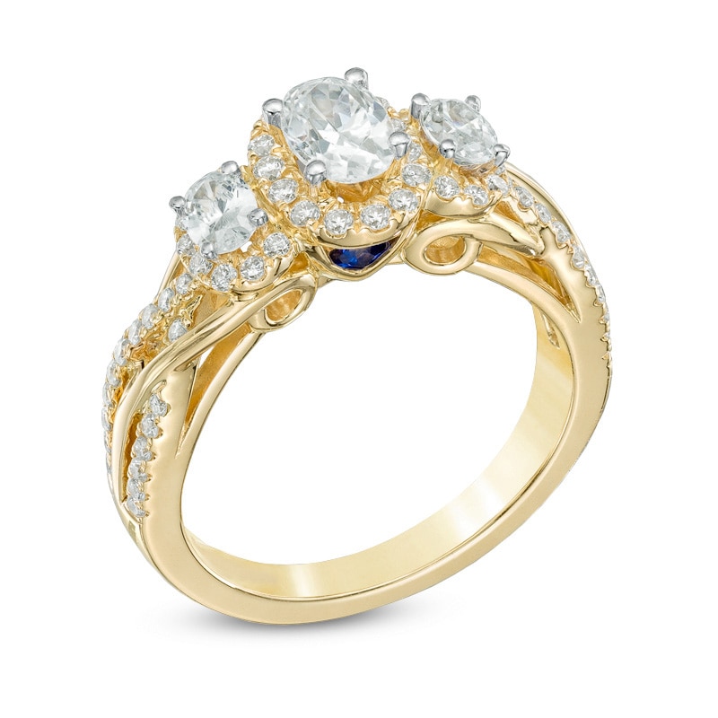 Previously Owned - Vera Wang Love Collection 0.95 CT. T.W. Oval Diamond Three Stone Engagement Ring in 14K Gold|Peoples Jewellers