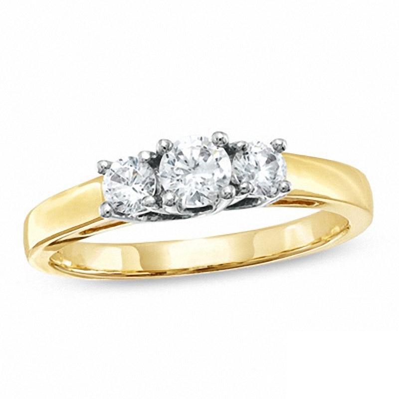 Previously Owned - 0.50 CT. T.W. Diamond Three Stone Engagement Ring in 14K Gold