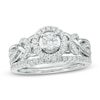 Thumbnail Image 0 of Previously Owned - 0.75 CT. T.W. Diamond Frame Braid Shank Bridal Set in 10K White Gold