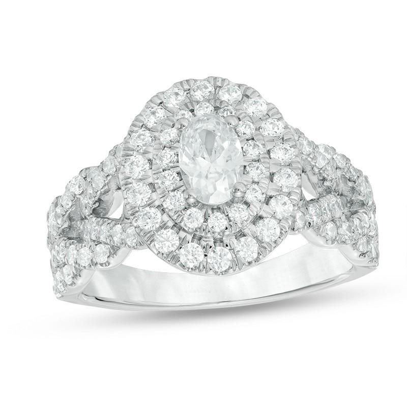 Previously Owned - Love's Destiny by Peoples 1.50 CT. T.W. Oval Diamond Engagement Ring in 14K White Gold (I/SI2)