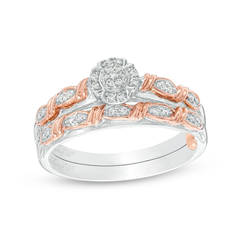 Previously Owned - 0.10 CT. T.W. Composite Diamond Frame Twist Ribbon Interlocking Bridal Set in 10K Two-Tone Gold
