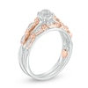 Thumbnail Image 2 of Previously Owned - 0.10 CT. T.W. Composite Diamond Frame Twist Ribbon Interlocking Bridal Set in 10K Two-Tone Gold