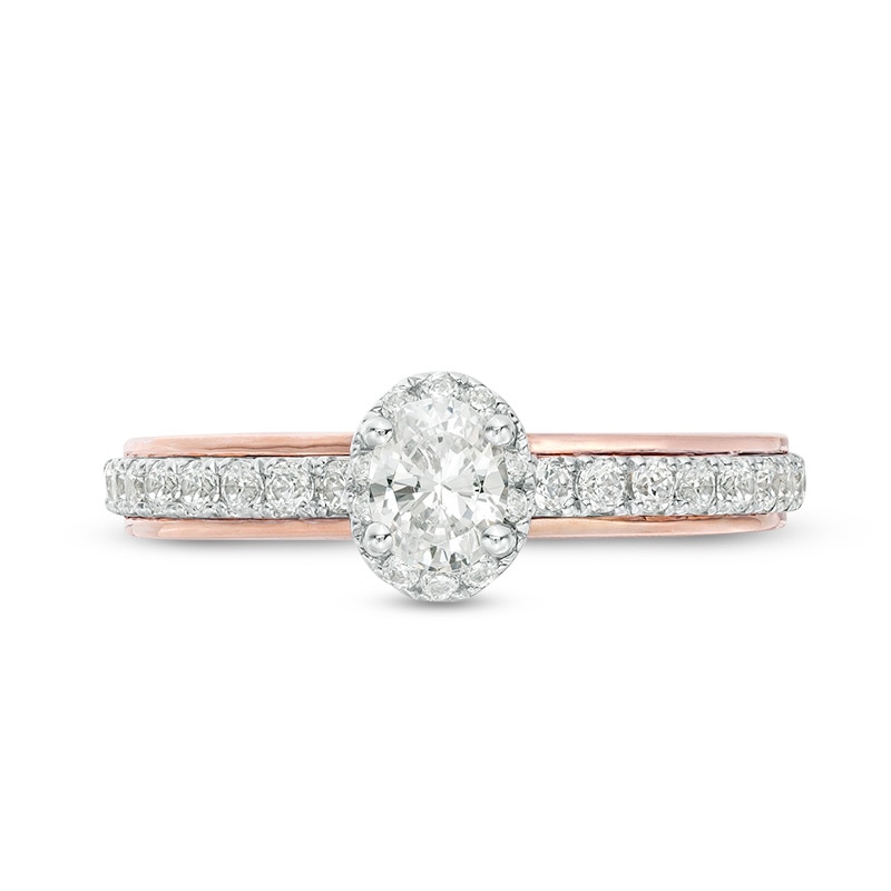 Previously Owned - Vera Wang Love Collection 0.60 CT. T.W. Oval Diamond Frame Engagement Ring in 14K Two-Tone Gold