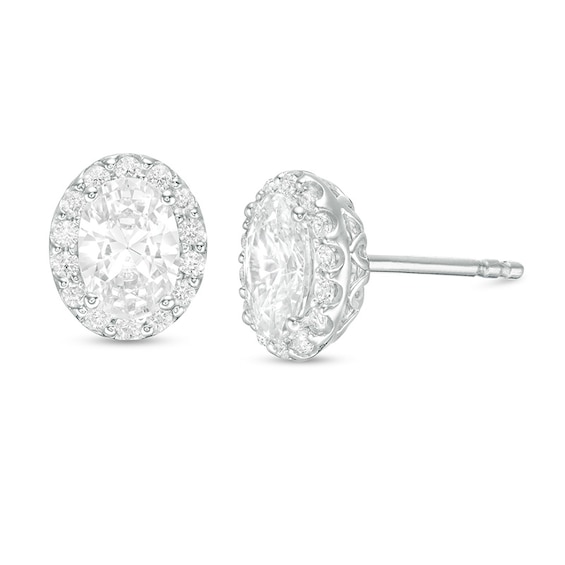 Previously Owned - 1.45 CT. T.W. Oval Diamond Frame Stud Earrings in 14K White Gold (I/SI2)