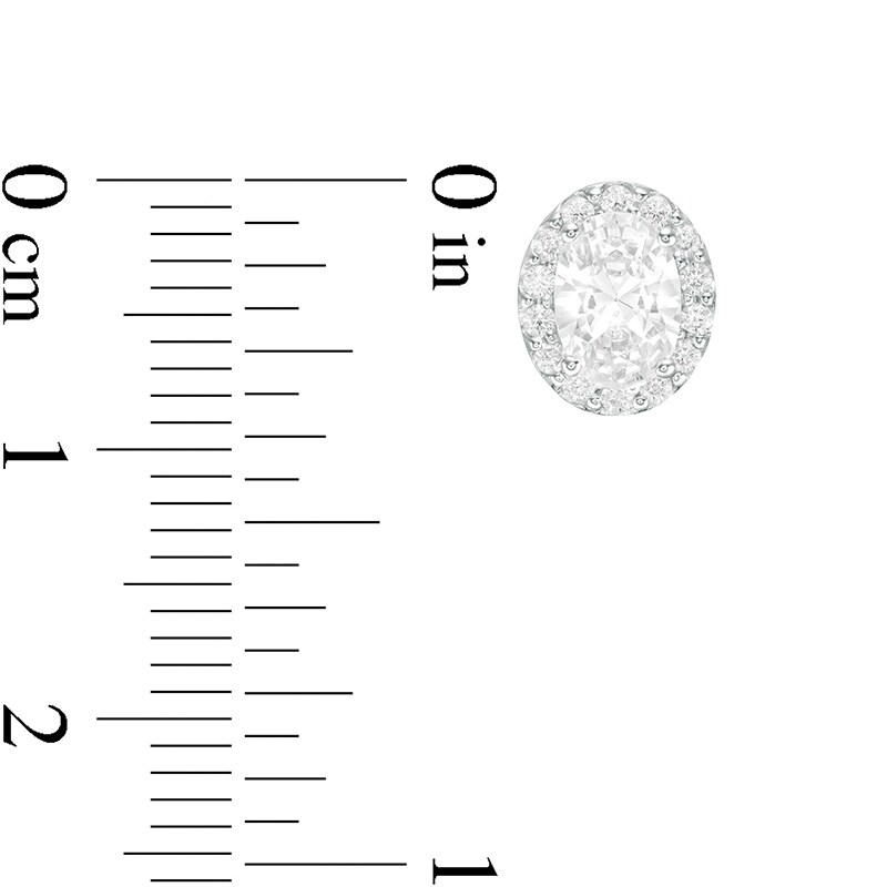 Previously Owned - 1.45 CT. T.W. Oval Diamond Frame Stud Earrings in 14K White Gold (I/SI2)
